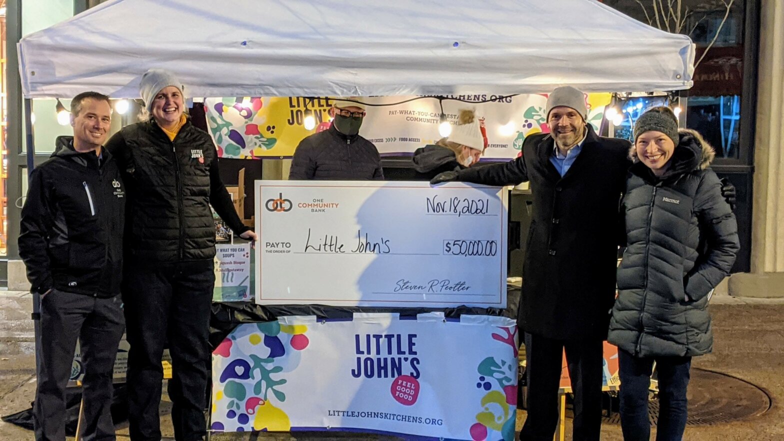 Photo with a Big Check for $50,000