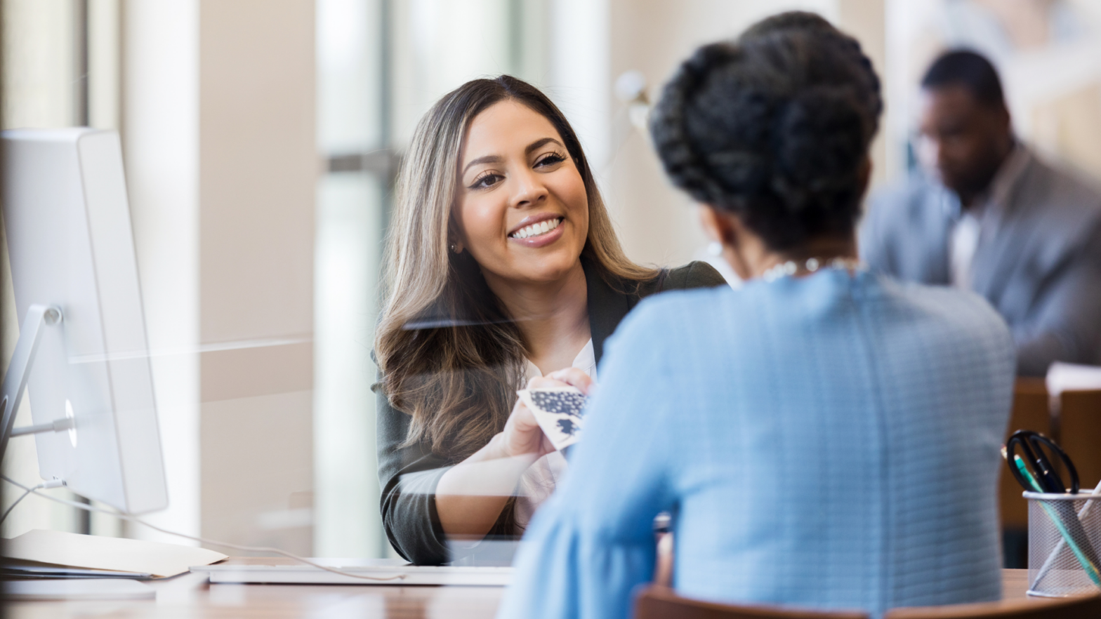 woman opening account at bank
