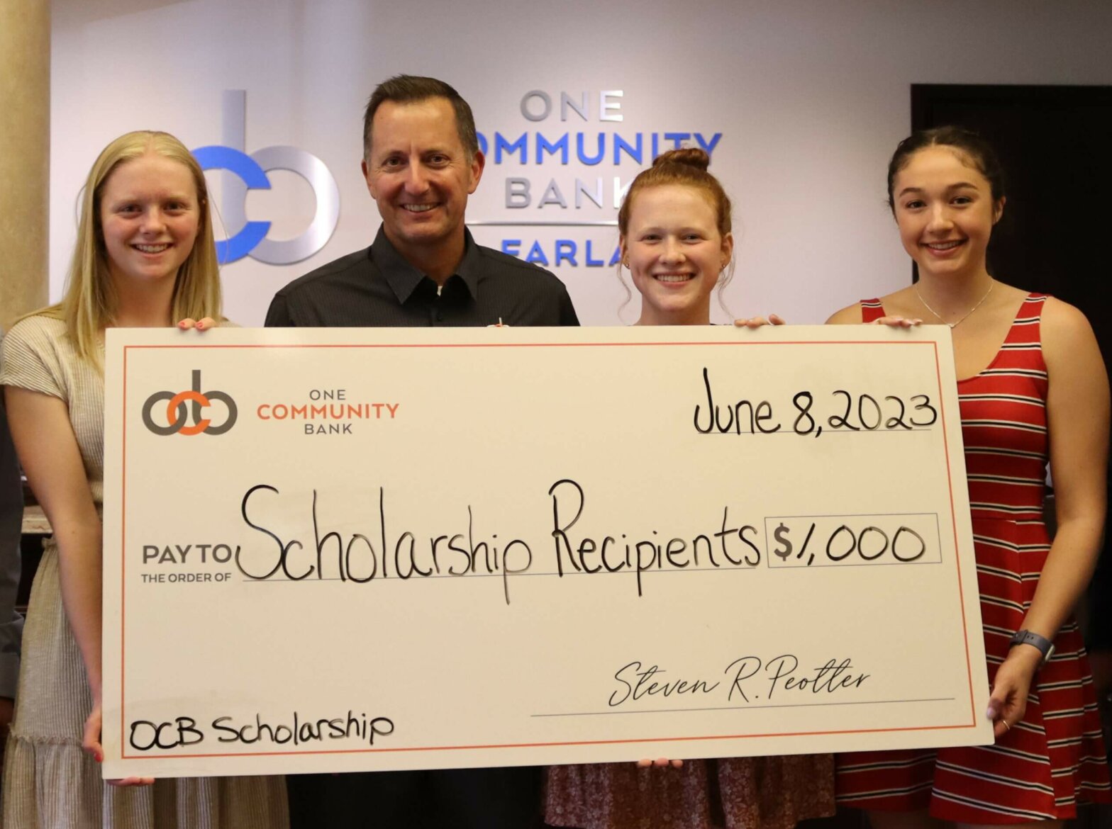 Pictured is Steve Peotter, One Community Bank President and CEO, with the 2023 Scholarship Program recipients.