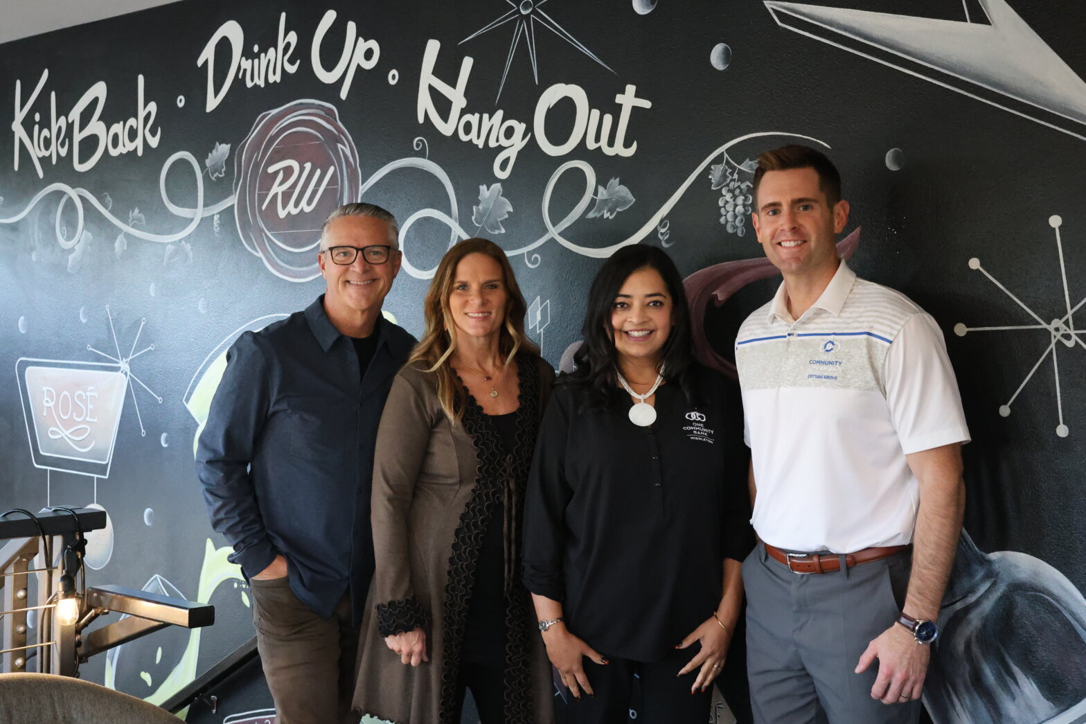 group standing inside Red and White Winebar
