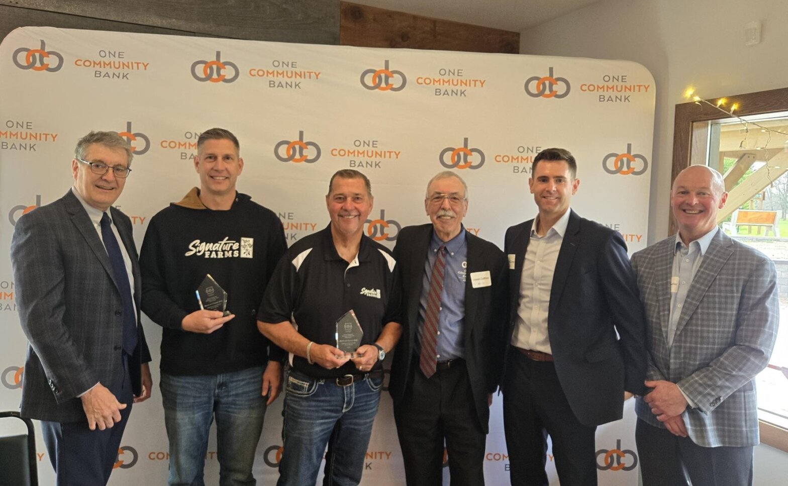 Group photo of OCB colleagues and Signature Farms