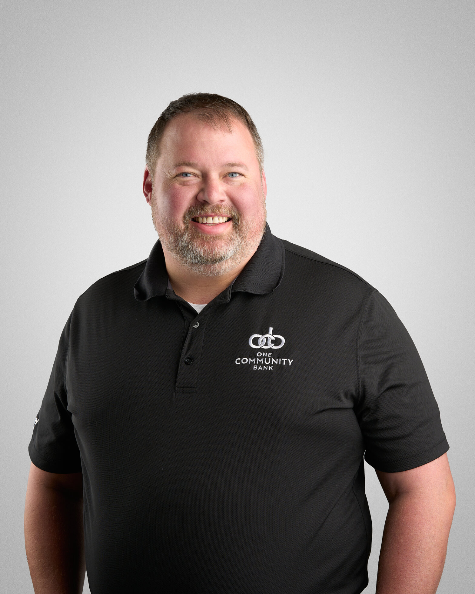 Professional headshot of Brent